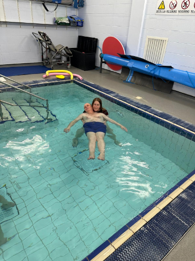 Resident having water therapy